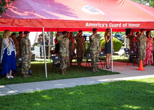 Senior leaders from across Fort Bragg, N.C. render honors during the playing of the National Anthem at the 82nd Airborne Division Change of Command and Change of Responsibility Ceremony, July 10, 2020. During the ceremony, Maj. Gen. James Mingus relinquished command to Maj. Gen. Christopher T. Donahue and Command Sgt. Maj. Cliff Burgoyne relinquished responsibility to Command Sgt. Maj. David Pitt.