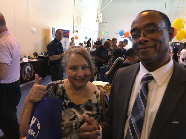 Fort Hunter Liggett Management Analyst Joel Pean with wife Eike at a Community Expo.