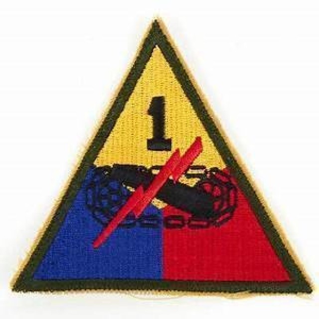 Fort Bliss, Texas - 1940: Early 1st Armored Division Patch
In 1940, Maj. Gen. Chaffee combined the 7th Cavalry Brigade (Mechanized) patch with the triangle of the old World War I Tank Corps to create a patch for his new Armored Force. This gave the Armored Force patch a historical significance, linking its origin with the Tank Corps. The War Department officially designated the insignia on Nov. 22, 1940. It was originally approved without the “Old Ironsides” tab. Part of the 1st Armored Division & Fort Bliss Museum collection. (Image courtesy of the 1st Armored Division & Fort Bliss Museum)