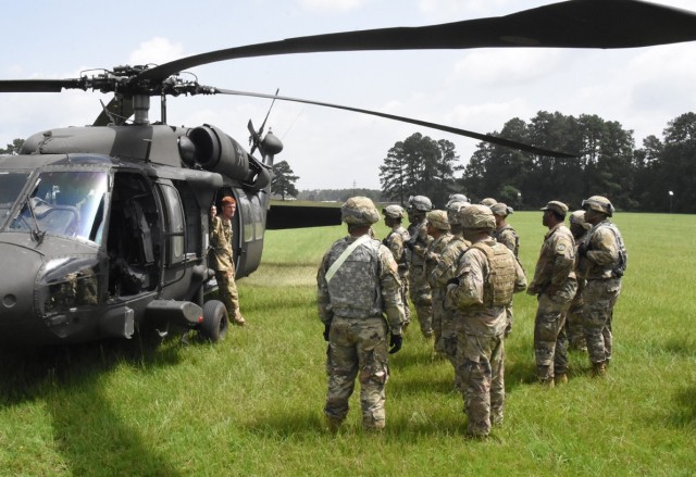 Soldiers with the 41st Trans Co and A Co, 1st Bn, 5th Avn Reg, conduct sling load operations on Fort Polk's Honor Field July 2.
