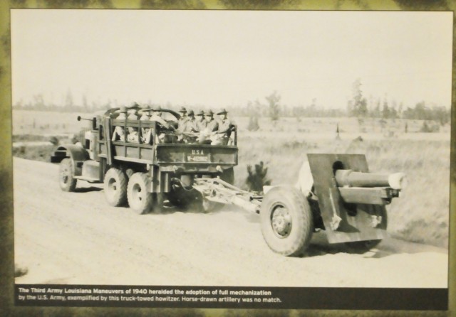 Taken from inside the Fort Polk Museum, this photo depicts troops being moved via vehicle during the Louisiana Maneuvers in 1940. Prior to this time, the Army was still marching units to and from different locations.