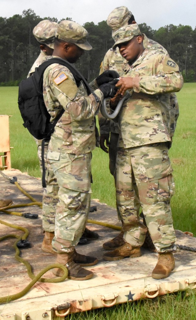 41st Trans Co Soldiers prepare sling load equipment for operations on Fort Polk's Honor Field July 2.