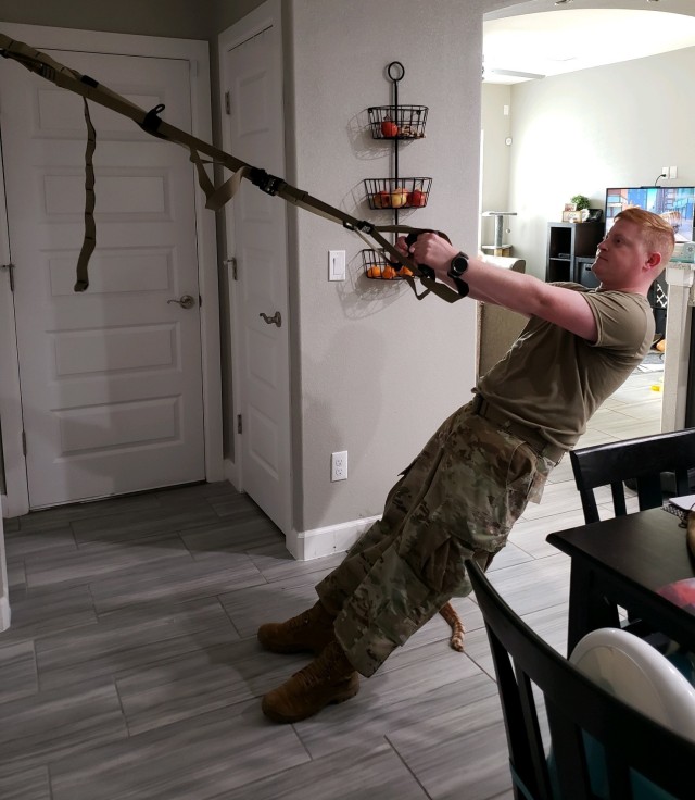 U.S. Army Sgt. Benjamin Davis, a Soldier assigned to the Soldier Recovery Unit at Fort Bliss, Texas, performs an at-home TRX workout. During the COVID-19 pandemic, the adaptive reconditioning program at Fort Bliss has provided virtual at-home...