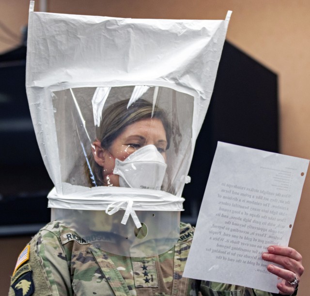 Lt. Gen. Laura Richardson, commander of U.S. Army North, goes through the safety precautions before entering the patient ward of the Edison Field Medical Site in Edison, N.J., April 13, 2020. While the peak of her command&#39;s COVID-19 response...