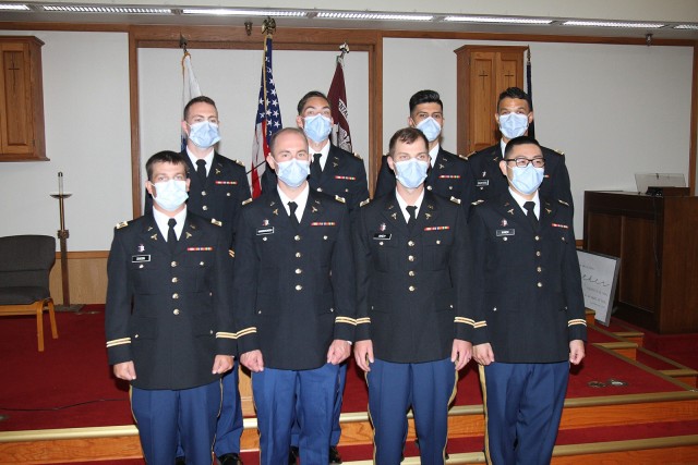 Graduates of the 2020 Comanche Advanced Education in General Dentistry 12 Month program pose for a group photo. First row from left are: Capts. Corby Dixon, Ross Vandercreek, Mitchell Akey, and Eugene Paek. Back row from left are: Capts. Alex...