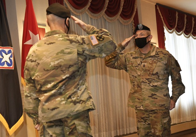 Command Sgt. Ma. Michael J. Perry III, CASCOM CSM, salutes Maj. Gen. Rodney D. Fogg, CASCOM and Fort Lee commanding general during Perry's relinquishment of responsibility ceremony at the Lee Club July 10.  Perry, who spent two years as CSM, is on his way to the 1st Theater Support Command. CSM Jorge Escobedo is Perry's replacement.