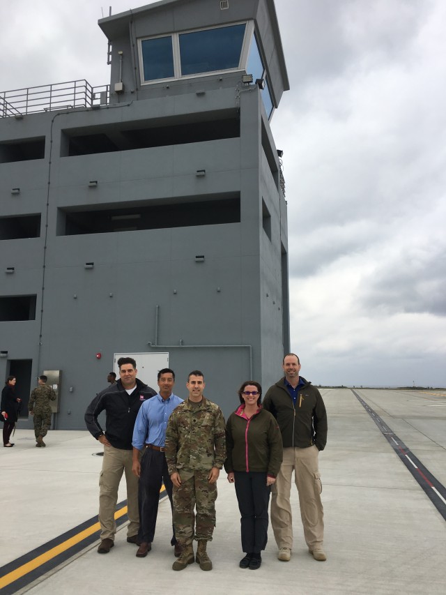 Members of the PDT celebrate the ribbon-cutting for the LHD.