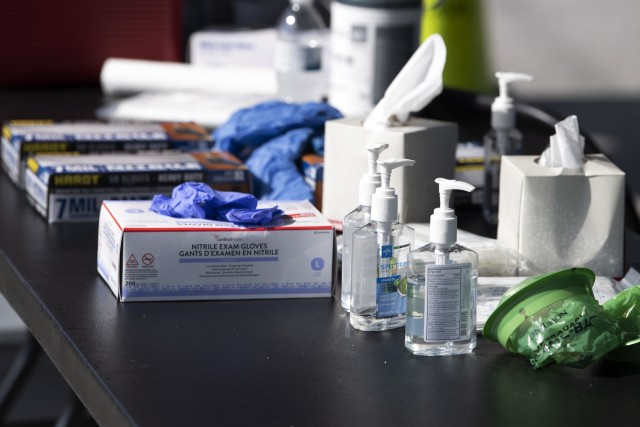 Supplies used to ensure the cleanliness and safety of providers and patrons sits on a table during drive through COVID-19 testing July. 10.
