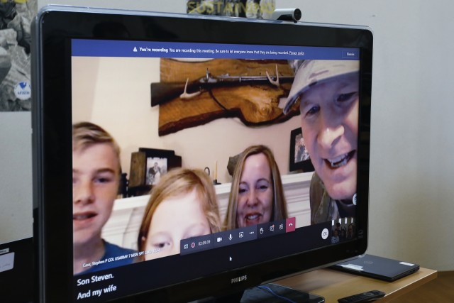 Col. Stephen P. Case and family pose from their home in Alabama after relinquishing command of the 209th Digital Liaison Detachment July 19, 2020. Col. Case attended the change of command ceremony virtually. The detachment, headquartered at U.S....