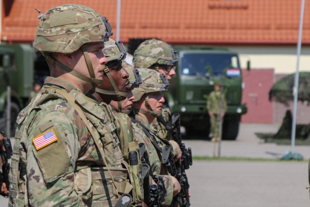 U.S. Army Soldiers assigned to 2nd Cavalry Regiment march during the pass in review portion at a change of command ceremony in Bemowo Piskie Training Area, Poland, July 17, 2020. After a 6-month rotation, 3rd Squadron, 2nd Cavalry Regiment was...