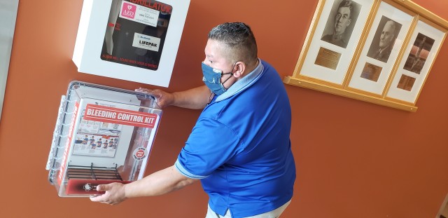 Chris Talamantez installs one of many Stop the Bleed kits at Brooke Army Medical Center, Fort Sam Houston, Texas, July 17, 2020. The kits, which contain items such as a tourniquet and trauma dressing, are part of the Stop the Bleed campaign, an...