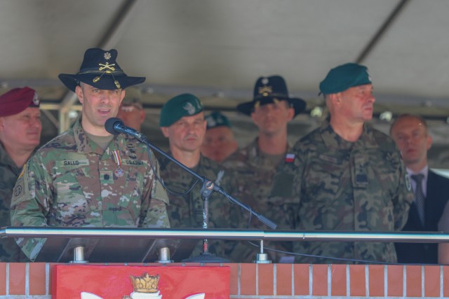 U.S. Army Lt. Col. Andrew Gallo, 3rd Squadron, 2nd Cavalry Regiment commander and outgoing Battle Group Poland commander, speaks during a change of command ceremony in Bemowo Piskie Training Area, Poland, July 17, 2020. After a 6-month rotation,...