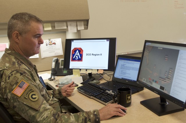 Maj. David Finn, a plans officer at the 377th Theater Sustainment Command, reviews forecast data at the command headquarters in Belle Chasse, La. The 377th Theater Sustainment Command coordinates with U.S. Army North and Federal Emergency...