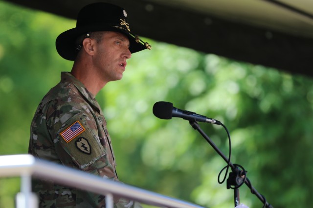 U.S. Army Lt. Col. Jeffery Higgins, the 2nd Squadron, 2nd Cavalry Regiment and incoming Battle Group Poland commander, speaks during a change of command ceremony in Bemowo Piskie Training Area, Poland, July 17, 2020. After a 6-month rotation, 3rd Squadron, 2nd Cavalry Regiment was replaced by 2nd Squadron, 2nd Cavalry Regiment. (U.S. Army photo by Cpl. Justin W. Stafford)