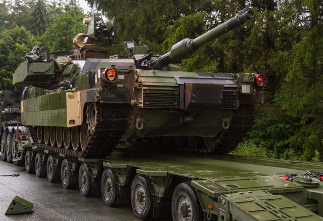 An M1 Abrams Main Battle Tank is loaded on an M1300 Heavy Equipment Transport System at Bergen-Hohne Training Area, Germany, July 10, 2020 prior to phase two of DEFENDER-Europe 20. The M1300 is specifically rated for German roads unlike its...