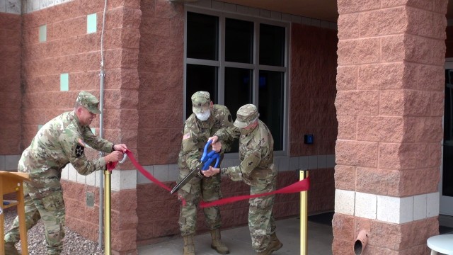 Maj Gen. Laura Potter, Commanding General, U.S. Army Intelligence Center of Excellence & Fort Huachuca, (right) and Capt. Thomas Gilder, Flight Surgeon,  cut a ribbon marking the opening a new Military Intelligence Student Clinic at Fort Huachuca, Ariz.