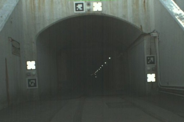 The entrance of the tunnel marks the beginning of the Tunnel Circuit course of the DARPA Subterranean Challenge.