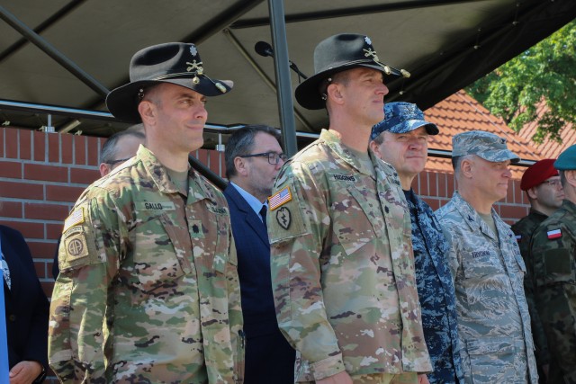 U.S. Army Lt. Col. Andrew Gallo, commander of the 3rd Squadron, 2nd Cavalry Regiment, stands next to Lt. Col. Jeffery Higgins during a change of command ceremony in Bemowo Piskie Training Area, Poland, July 17, 2020. Gallo relinquished his command of Battle Group Poland to Higgins, the 2nd Squadron, 2nd Cavalry Regiment commander. (U.S. Army photo by Cpl. Justin W. Stafford)