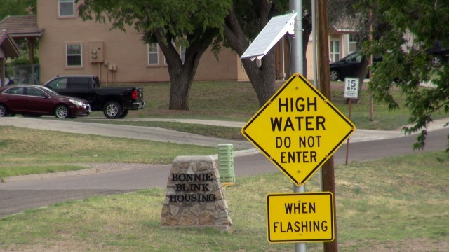Signs warn residents of Fort Huachuca, Arizona not to enter a low water crossing as monsoon activity with the potential for heavy rains ramps up in Southern Arizona .