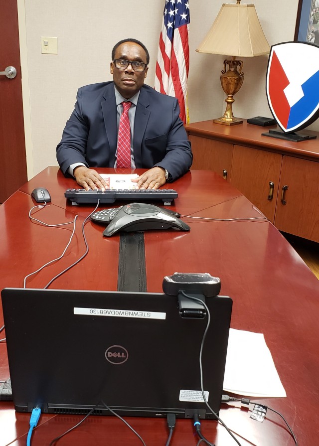 Everard Garnette, European Deterrence Initiative, Army Field Support Battalion-Stewart, Fort Stewart, Georgia, participates in the graduation from his workplace July 16. At the end of the ceremony Garnette read a long, heartfelt speech to his...