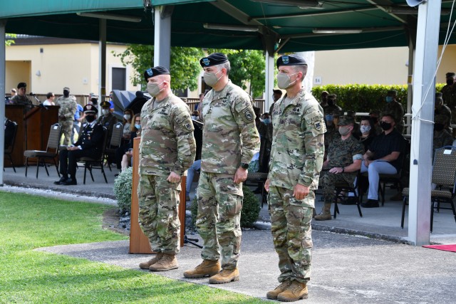 From left, Maj. Gen. Roger L. Cloutier, the outgoing U.S. Army Africa commanding general, Gen. Stephen Townsend, the commander of U.S Africa Command, and Maj. Gen. Andrew M. Rohling, the incoming USARAF commanding general, attend the change of...