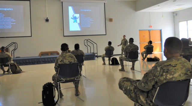 Sgt. 1st Class Chanelcherie Demello, Senior Instructor/Writer for the Human Resources Specialist Course at the 4960th Multi-Functional Training Brigade, Fort Shafter Flats, Honolulu, Hawaii, speaks to the students attending the course July 17th, 2020.