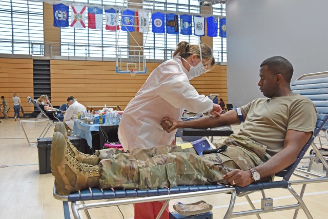 WIESBADEN, Germany – A Soldier donates blood July 14, 2020, at the fitness center on Clay Kaserne. The blood drive was the first in Europe where people who have lived on the continent for more than five years could donate.