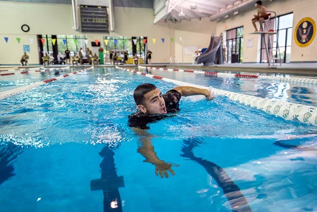 Sgt. Bryan Jacobo, 15th Military Police Brigade, participates in the Best Warrior Competition July 1 at Fort Leonard Wood, Mo. Fort Leavenworth Best Warrior participants competed in the Combined Arms Center and Fort Leavenworth Noncommissioned...