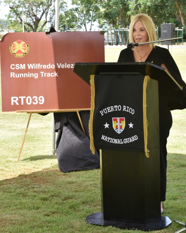 At the Memorialization – Dedication Ceremony of a recently renovated running track in Fort Buchanan, in honor of the late Command Sgt. Maj. Wilfredo Vélez Flores, of the Puerto Rico Army National Guard held July 14, 2020, Marielis Matos,...