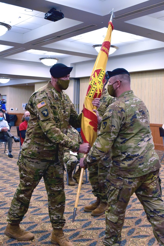 On July 16, 2020, U.S. Army Garrison Fort Riley hosted a change of command ceremony between Col. Stephen Shrader and Col. William B. McKannay.  Command Sgt. Maj. Timothy Speichert, the top NCO for the Garrison at Fort Riley, passes the guidon to...
