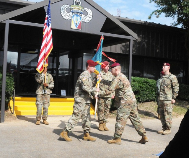 Brig. Gen. Patrick D. Frank, Joint Readiness Training Center and Fort Polk commanding general, passes the colors to Col. Jason A. Curl, the incoming Operations Group commander, at the change of command ceremony held July 16 in front of Operations...