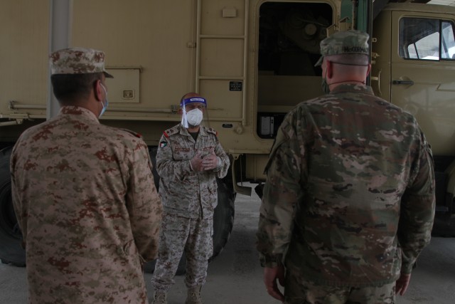 U.S Army Soldiers of the 75th Field Artillery Brigade and Kuwaiti Army Soldiers stand together in Kuwait, July 15, 2020. The Kuwaiti Soldiers were meeting with the commander of the 75th FA to showcase their capabilities and plan future exercises....