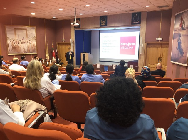Army Lt. Col. Joey Kamerath, the Trauma, Burn, and Rehabilitative Medicine team (TBRM) Rehabilitation Director, briefs fellow medical officers and staff at Zayed Military Hospital, in Abu Dhabi, on how to build a viable, collaborative...