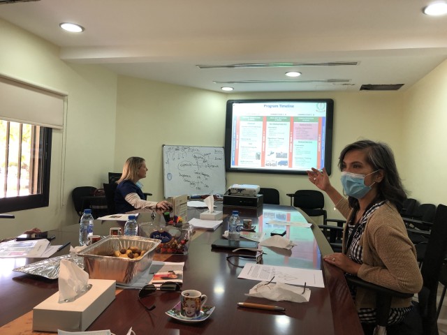 U.S. Army Dr (COL) Brigilda Teneza, right, and Navy CDR Amy White, left, brief the UAE medical student training proposal to Zayed Military Hospital Education staff. The TBRM mission is to advise, train, mentor and provide technical support to UAE...