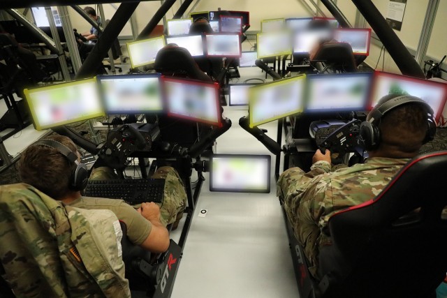 Researchers at the U.S. Army Combat Capabilities Development Command’s Army Research Laboratory develop Transparent Multi-Modal Crew Interface Designs. Soldiers, shown in the Information for Mixed Squads Laboratory, test these designs that augment the warfighter machine interface used to control the Next Generation Combat Vehicle. 