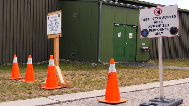 Restricted access signs are posted in and around the Deployment Processing Center, or DPC, on Rhine Ordnance Barracks in Kaiserslautern, Germany to ensure the safety of the force and the local community. The DPC currently houses incoming personnel...