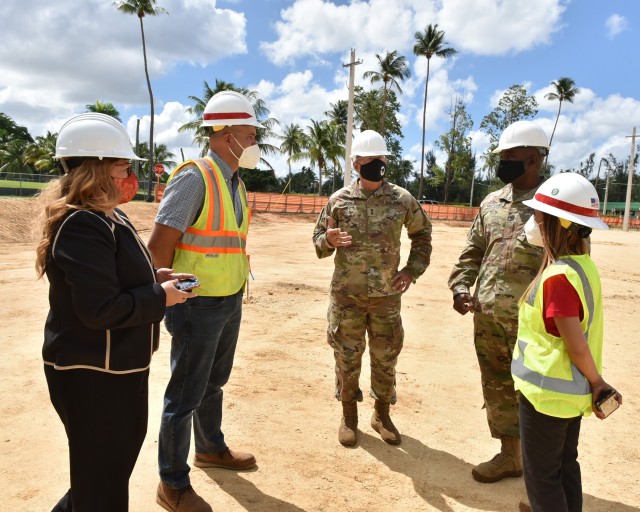 Fort Buchanan Senior Commander and 81st Readiness Division (81st RD) Commanding General Maj. Gen. Kenneth D. Jones accompanied by 81st RD Command Sgt. Maj. Levi Maynard talked with US Army Corps of Engineers (USACE) Area Engineer Maricarmen...