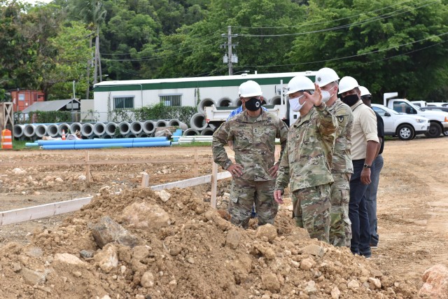 Fort Buchanan Garrison Commander Col. Joseph B. Corcoran III shows installation Senior Commander and 81st RD Commanding General Maj. Gen. Kenneth D. Jones the location of the main entrance for the Army Reserve Center during a walk thru of the...