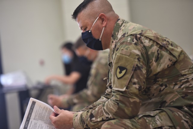 Drawing on support — Garrison leaders donate blood at American Red Cross event