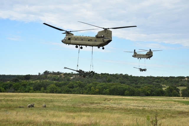 Bravo, 7-158 Aviation Regiment (GSAB), 11th Expeditionary Combat Aviation Brigade currently conducting Annual Training at Fort Hood, sling loads a M777A2 Howitzer during a Gun Raid with B Battery, Field Artillery Squadron, 3rd Cavalry Regiment , July 27 at Fort Hood. (U.S. Army photo by Maj. Marion Jo Nederhoed)