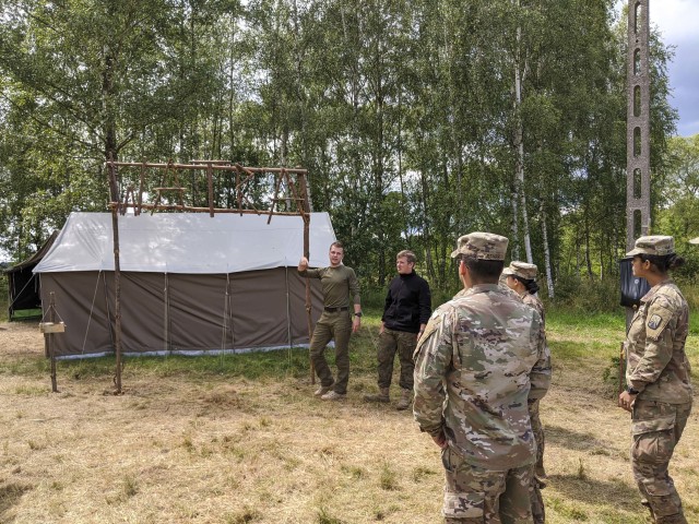 U.S. Army Soldiers from the Alaska National Guard’s 297th Regional Support Group and U.S. Army Reserve’s 266th Ordinance Company, out of Puerto Rico, and Bravo Company, 418th Civil Affairs Battalion, out of Missouri, spend the afternoon...