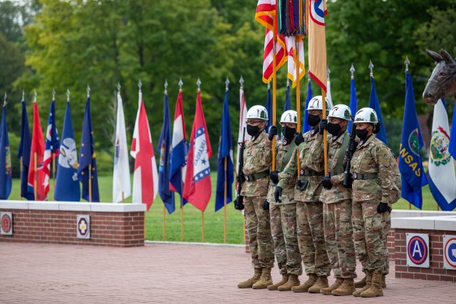 The 1st Theater Sustainment Command color guard, led by Command Sgt. Maj. Carey Welsh, senior enlisted advisor, Special Troops Battalion, 1st TSC, presents the colors during a change of responsibility ceremony held at Fort Knox, Kentucky, July 28, 2020. (U. S. Army Photo by Spc. Kaylee Harris, 1st TSC Public Affairs)