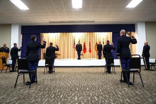 After completing Phase 2, warrant officer candidates of class 20-002 take their oath as they are appointed warrant officer ones in a ceremony held at the Kansas Regional Training Center in Salina, Kansas, June 27, 2020. Warrant Officer School of...