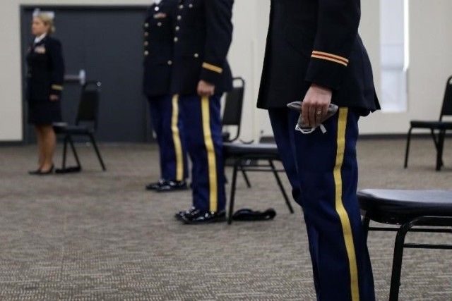 Amidst a pandemic, candidates of class 20-002 were still able to celebrate their graduation at the Kansas Regional Training Center in Salina, Kansas, June 27, 2020. The warrant officer candidates of class 20-002 were appointed warrant officer ones...