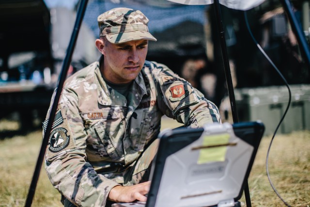 Air Force Staff Sgt. Rocco Gatta evaluates the weather during a field training exercise with the 173rd Airborne Brigade in Grafenwoehr Training Area, Germany, July 23, 2020.
...