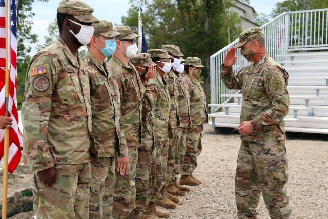 On Monday, July 27th 2020, General Joseph M. Martin, Vice Chief of Staff of the United States Army, lead the reenlistment ceremony of Michigan National Guardsmen during the Northern Strike 2020 exercise, at the Grayling Maneuver Training Center, in Grayling, Michigan. Guardsmen who received coins include Specialist Raymon Baskerville, Specialist Eshaun Simmons, Specialist Isarel Conerly, Specialist Silvano Caldera, Sergeant James Purvis, Sergeant Johnathan Beerman, and Sergeant Shareef Sasnasopa. (U.S. Air National Guard photo by Staff Sgt. Drew Schumann)