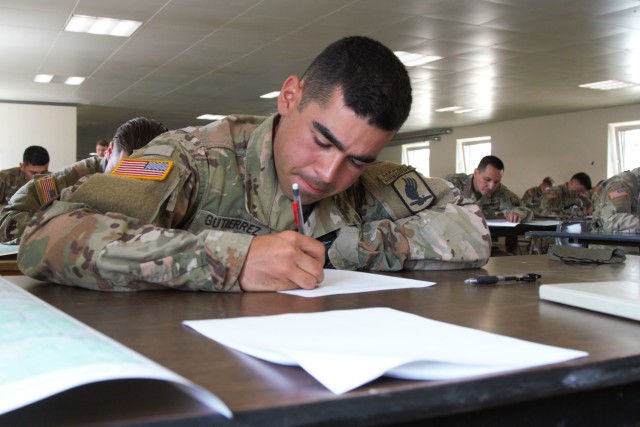 U.S. Army 1st Lt. Quinn Gutierrez, engineer officer, 173rd Airborne Brigade Combat Team, takes the written exam during the U.S. Army Europe European Best Warrior Competition at Hohenfels Training Area, Germany, July 24, 2020. The competition is an...