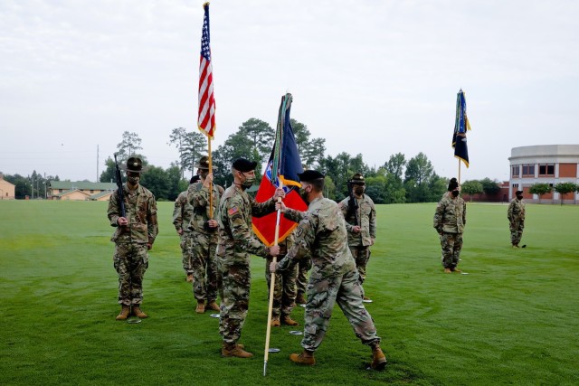 FORT BENNING, Ga. – During a ceremony reactivating the Army's 197th Infantry Brigade here July 31, Maj. Gen. Patrick J. Donahoe (foreground, right), commanding general of the U.S. Army Maneuver Center of Excellence and Fort Benning, passes...