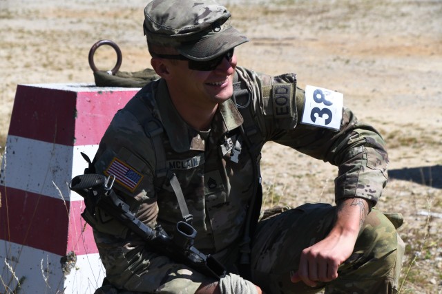 U.S. Army Staff Sgt. William McLain, explosive ordnance disposal specialist, 18th Sustainment Brigade, relaxes prior to next event during the U.S. Army Europe European Best Warrior Competition at U.S. Army Garrison Hohenfels Training Area,...