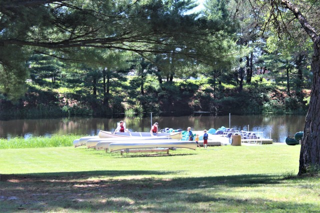 A scene of a family preparing to use a canoe at Suukjak Sep Lake at Pine View Campground in the Pine View Recreation Area is shown June 25, 2020, at Fort McCoy, Wis. The recreation area includes acres of publicly accessible land with hiking...